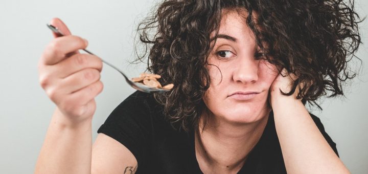 Gril eating cereal