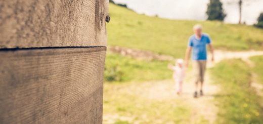Grandpa and granddaughter hike